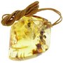 Figured pendant made of translucent amber